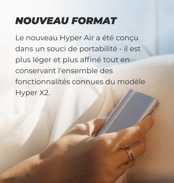 L'appareil glo Hyper Air tenu par une personne avec une description sur le design et nouveau format